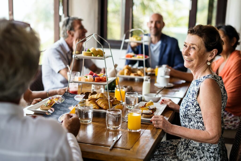 The Philomena | Seniors enjoying a luxury breakfast
