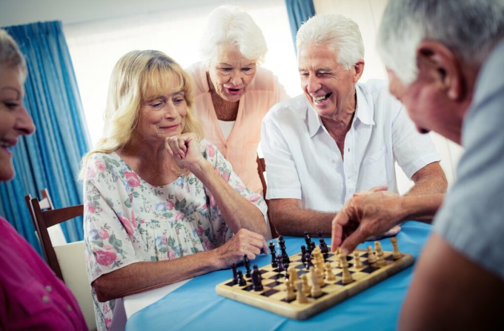 The Philomena | Group of seniors playing chess