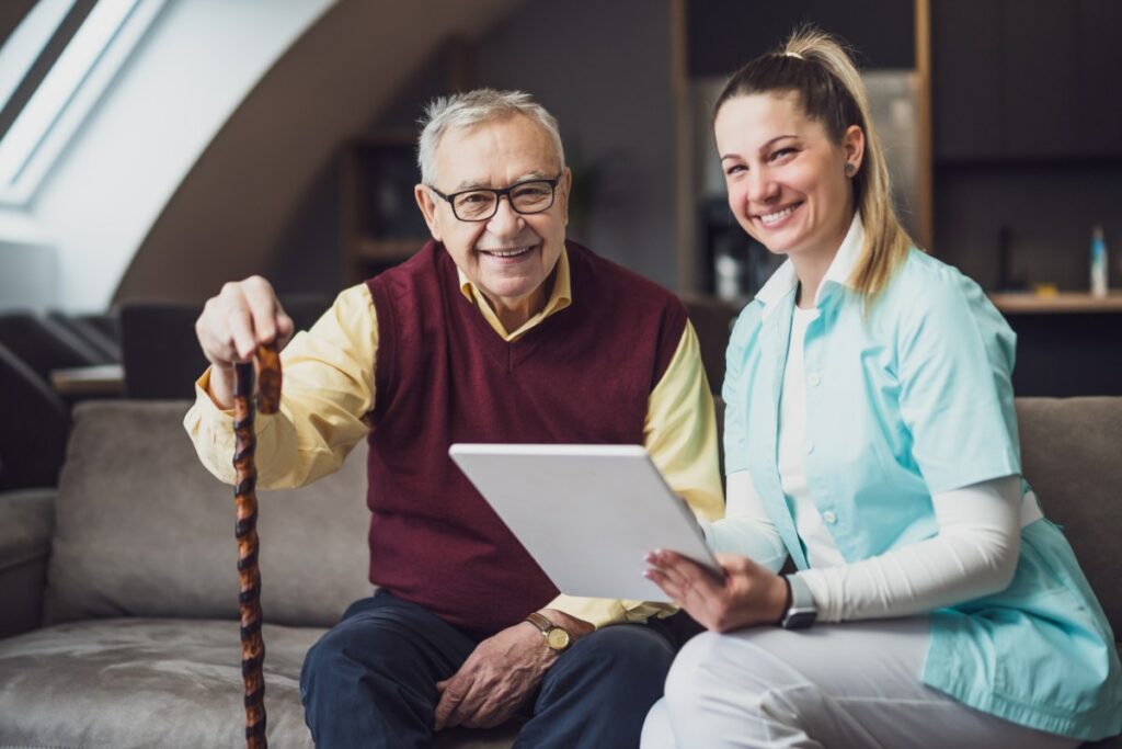 Philomena | Senior man smiling with caregiver
