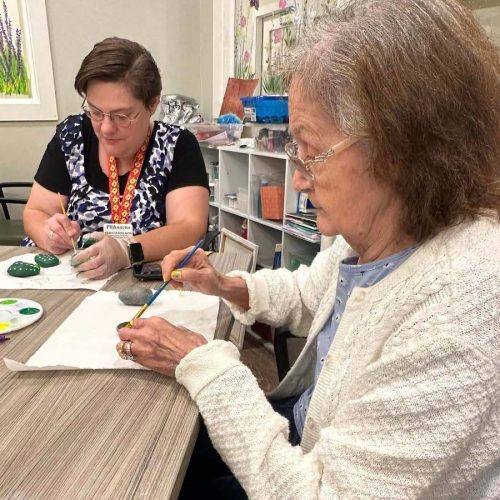 The Philomena | resident and caregiver painting